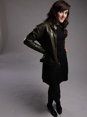 Maria Toledo standing in a leather jacket