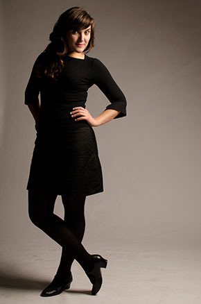 Studio portrait of Maria Toledo in a black dress