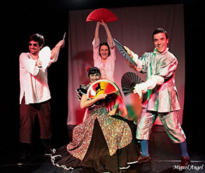 Maria Toledo on stage with two other performers